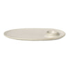 Beige oval plate with a speckled texture and a circular indent for candles or décor. Perfect for modern table settings.