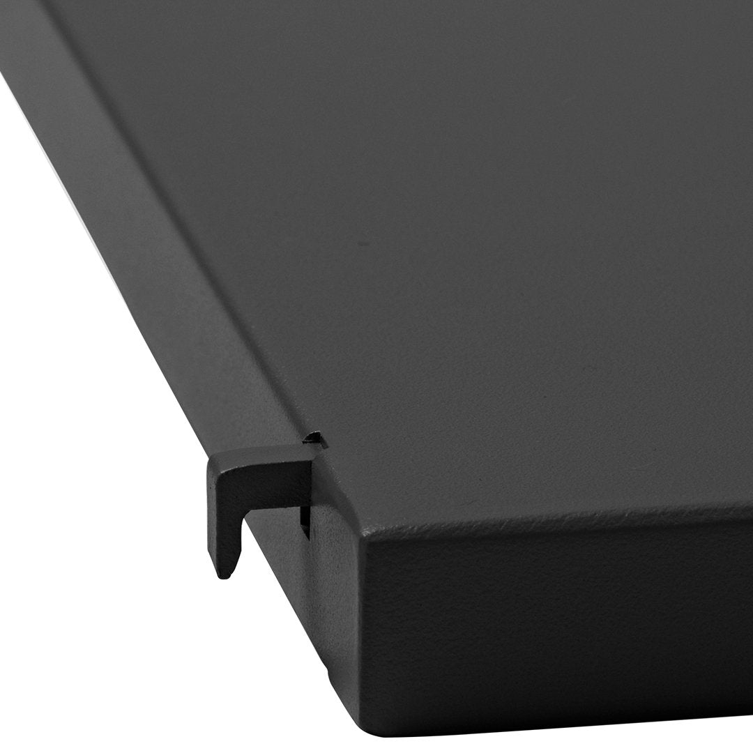 Black metal shelf corner detail with a sleek, smooth finish, showcasing a minimalist design. Perfect for modern decor.