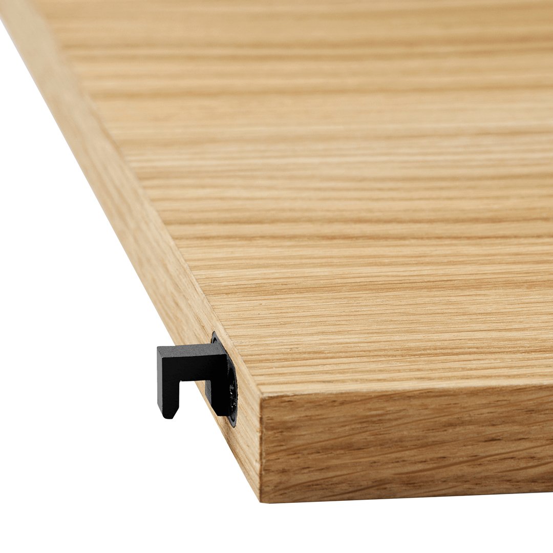 Light oak wood shelf with natural grain pattern and sleek black connector detail. Perfect for modern decor.