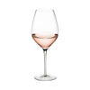 Elegant wine glass filled with light pink rosé, featuring a clear glass design for enhanced presentation.